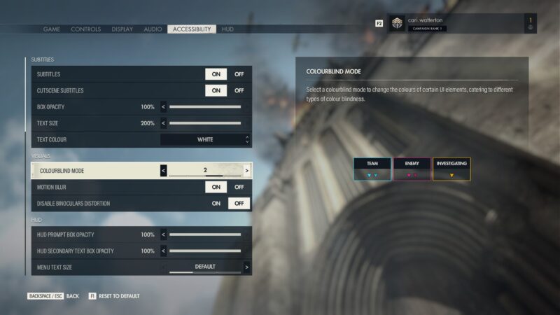 The Sniper Elite 5 Options Menu. In the Accessibility tab, the “colourblind mode” is selected. It is set to “2”. On the right is a preview of the colours, Team is Teal, Enemy is Fushia and Investigating is Orange.