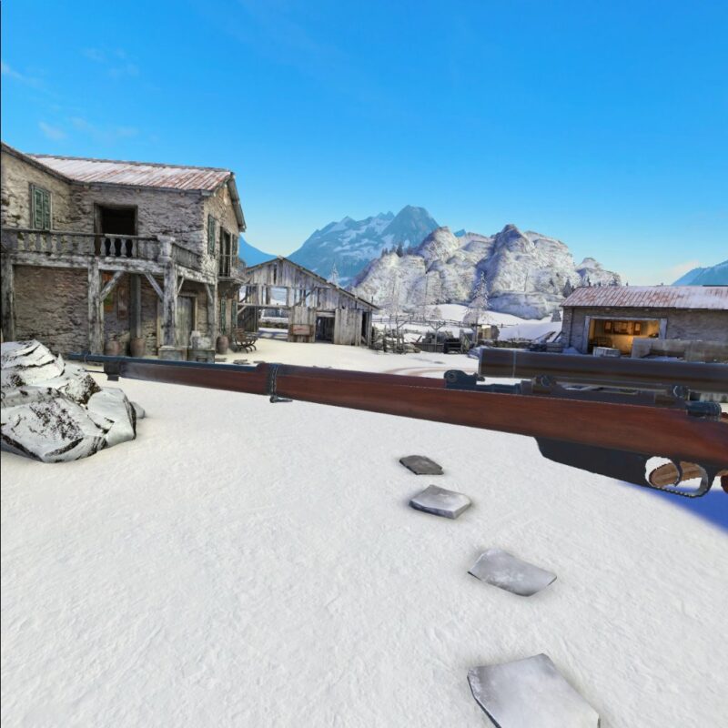 Gameplay of Winter Warrior showing the player examining a gun in a snowy scene. There is no UI.